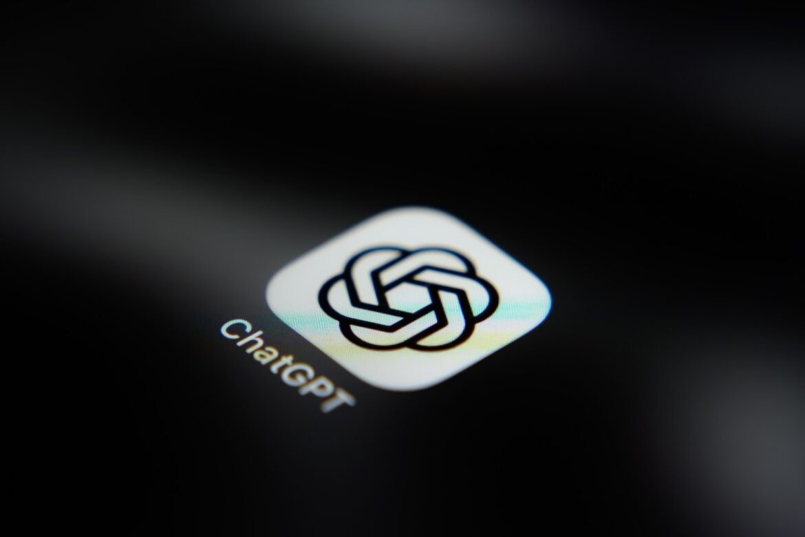The ChatGPT application icon is displayed on a smartphone screen.